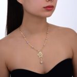 oummi x ruban gold necklace - Image 2